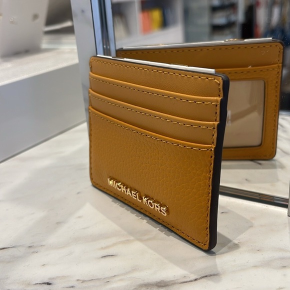 MICHAEL KORS
Large Pebbled Leather Card Holder Case
Cider
NWT - Picture 16 of 16